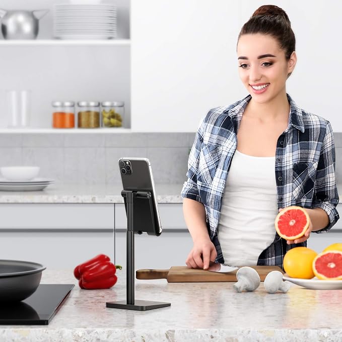 OMOTON CA02 Cell Phone Stand with Charging Hole for Desk Lightweight Black | Fits iPhone 17/Samsung Galaxy 4-7" · Hands-Free Call · Gaming · Live Streaming · Compact Portable for Travel, Office, Home