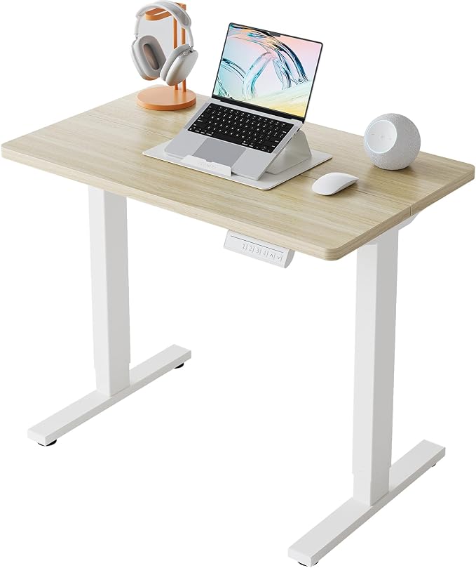 HUANUO 32x19 Inch Small Electric Standing Desk, Adjustable, Light Walnut | 176 Lbs Capacity, Rounded Corners, Wheel-Ready Feet, Compact Desktop, Apartment Workspace, 28.3–46.5 Inch Height Range