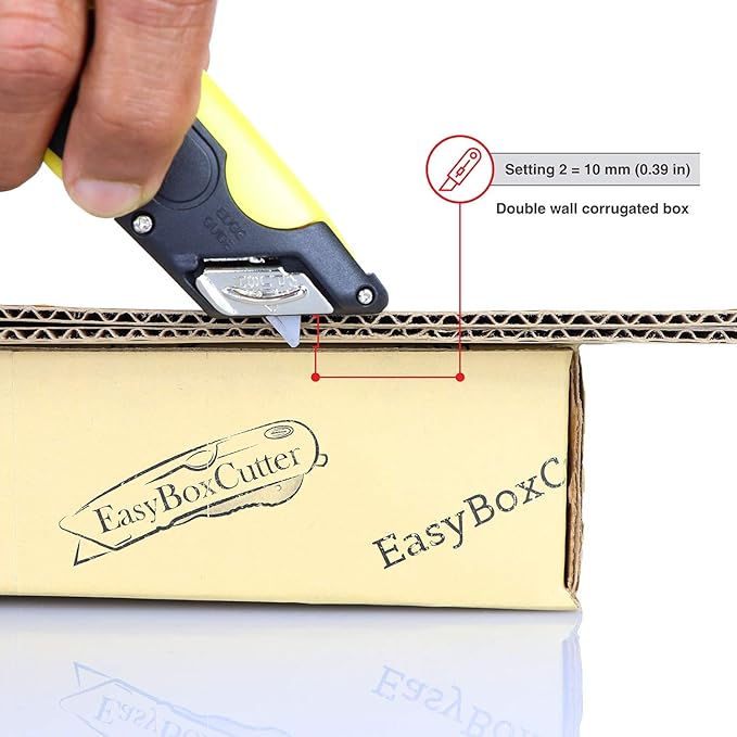 Modern Box Cutter, extra tape cutter at back, dual side edge guide, 3 blade depth setting, 2 blades and holster - Yellow Color 2000 STD