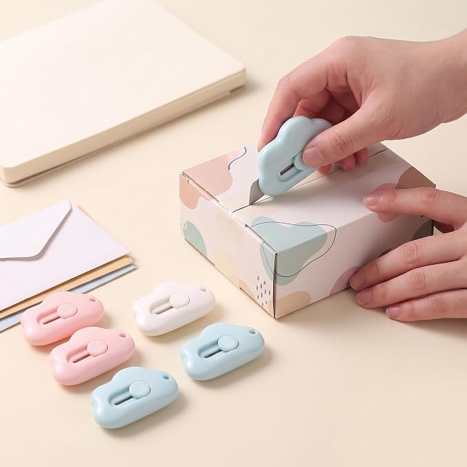 6 Pack Cloud Retractable Box Cutters Mini Package Openers | 6PCS cloud-shaped mini box cutters place compact package openers across home office desk craft travel or daily mail routines