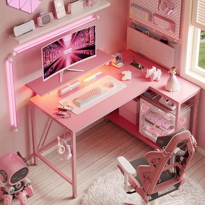 Bestier 42-Inch Pink L-Shaped Gaming Desk with Charging & LED | Charging 2AC+USB+Type-C, RGB LED 20 Colors/22 Modes, Reversible Shelves, Carbon Fiber Texture, Headset Hook, Small Space