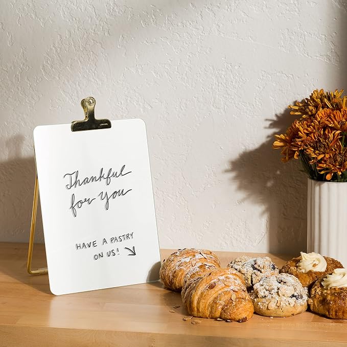 U Brands Desk Whiteboard Easel, Glass Dry Erase Board, Gold Wire Stand | A small white board and standing clipboard in one, with a marker whose cap is its own eraser and a clip that holds papers.