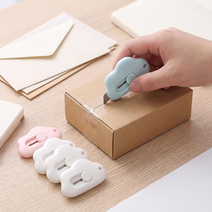 6 Pack Cloud Retractable Box Cutters Mini Package Openers | 6PCS cloud-shaped mini box cutters place compact package openers across home office desk craft travel or daily mail routines