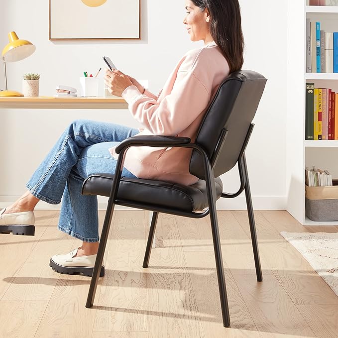 Amazon Basics Classic Faux Leather Office Desk Chair with Armrests, Metal Frame, Black, 27.4D x 23.6W x 35.8H in