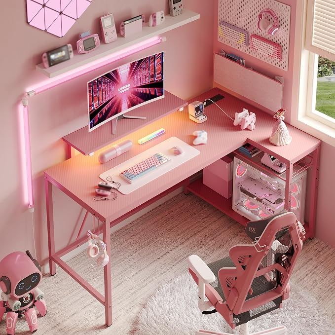 Bestier 52-Inch L-Shaped Gaming Desk with Charging & LED, Pink | Charging 3AC+2USB, RGB LED 20 Colors/22 Modes, Reversible Storage Shelves, Carbon Fiber Texture, Headphone Hook, 52 in